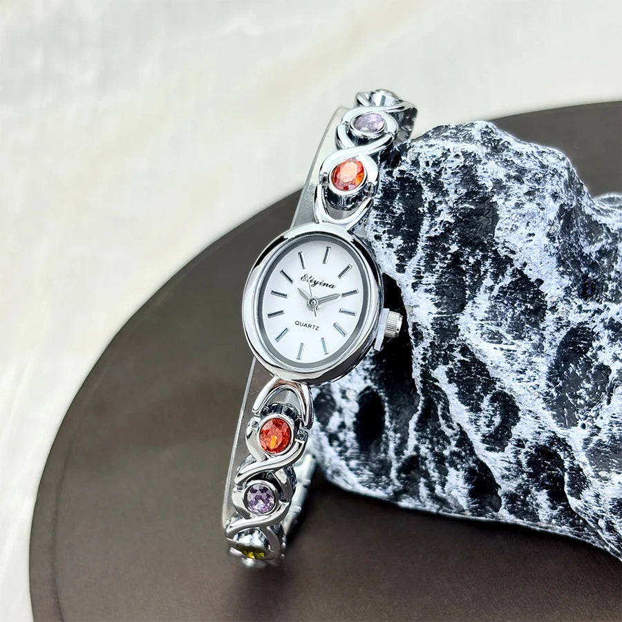 Elegant Lady's Retro round Color Gem Rainbow Quartz Watch with Chain Scale French Luxury Fashionable Ladies' Timepiece